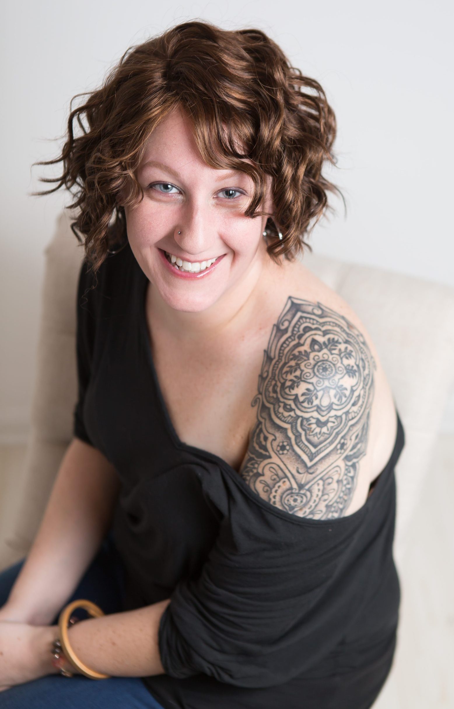 adorable girl with shoulder tattoo