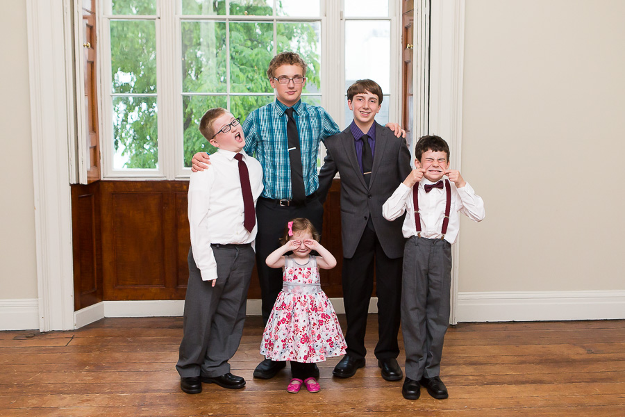 five kids making funny faces