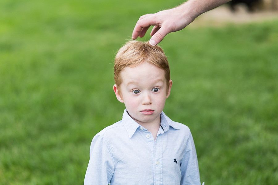 little boy looking surprised