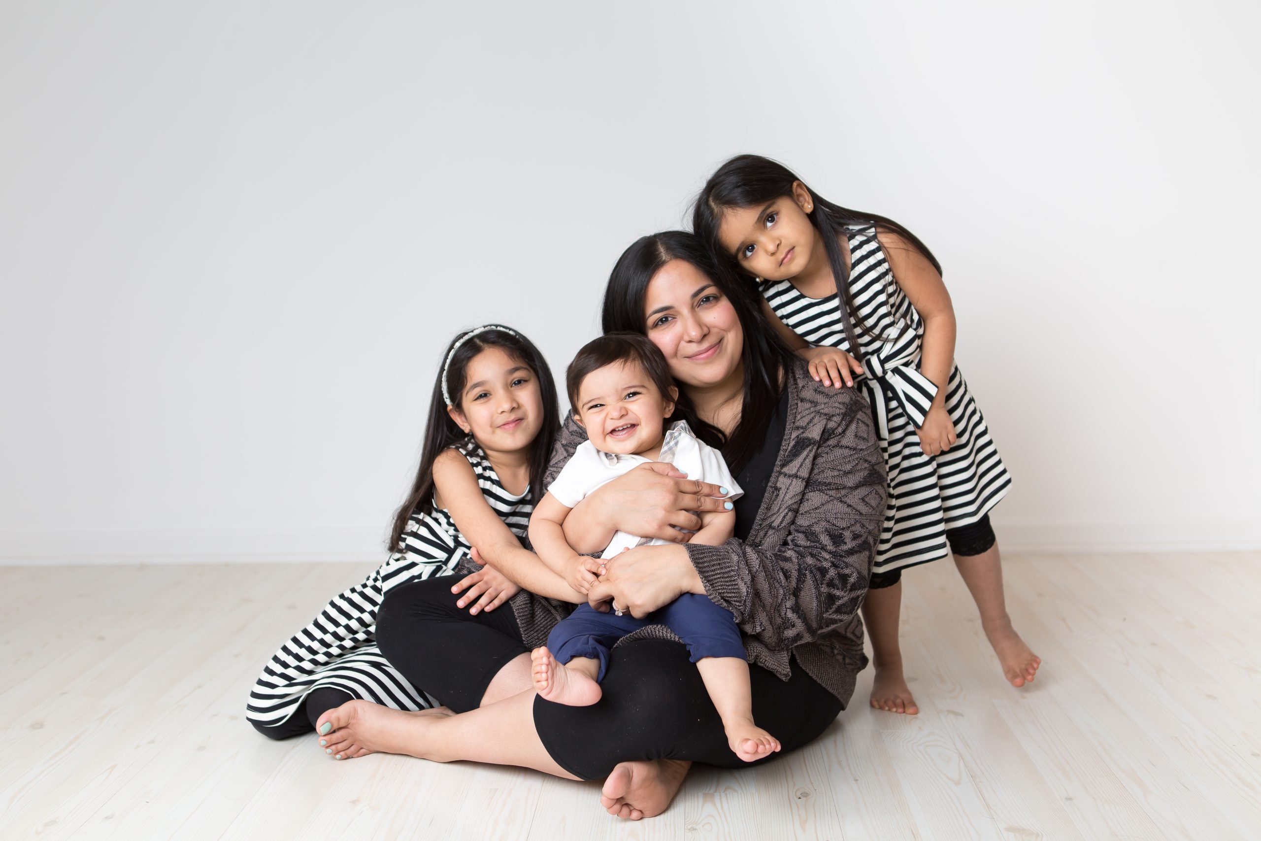mom with three kids in studio