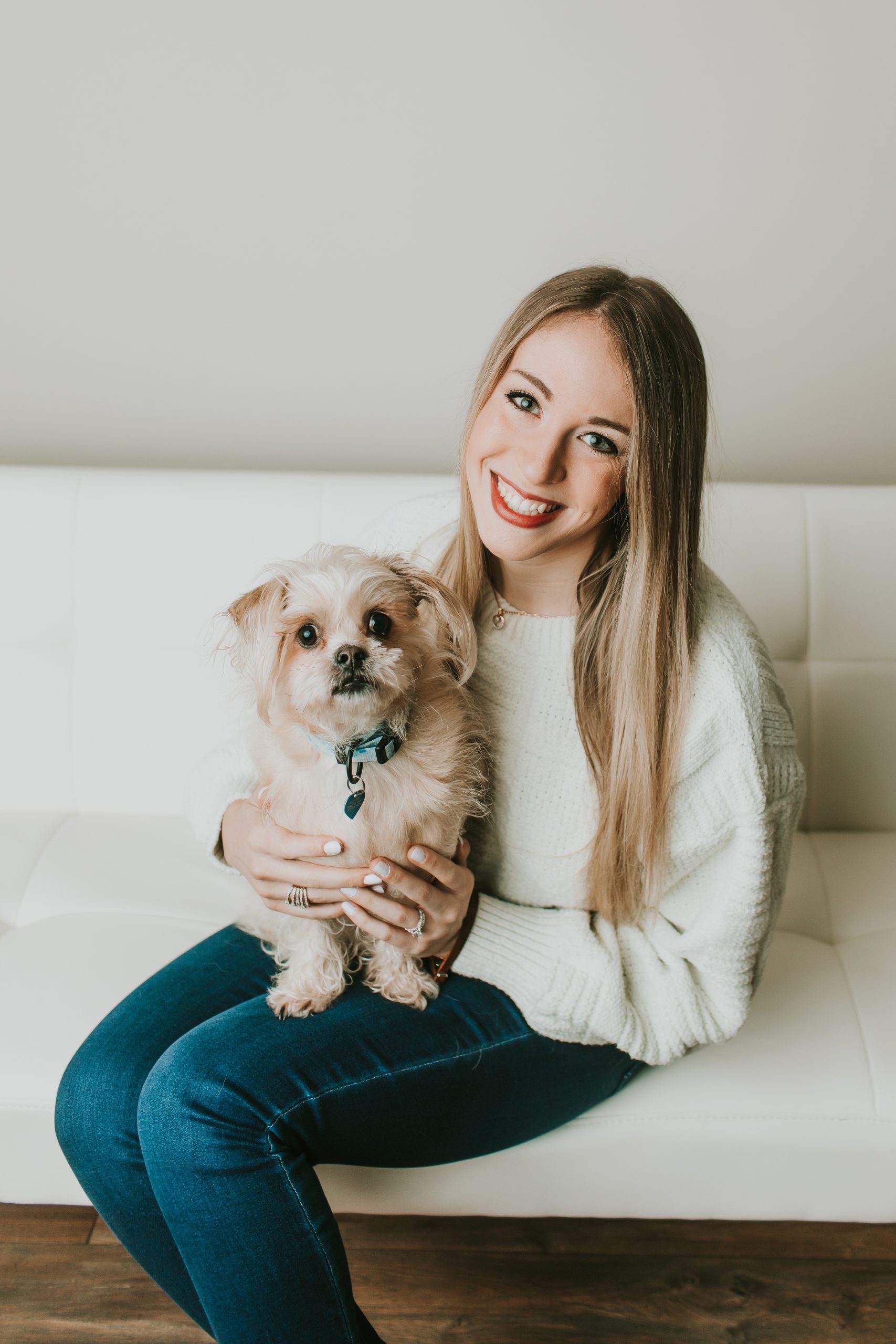 portrait of blonde girl with terrier