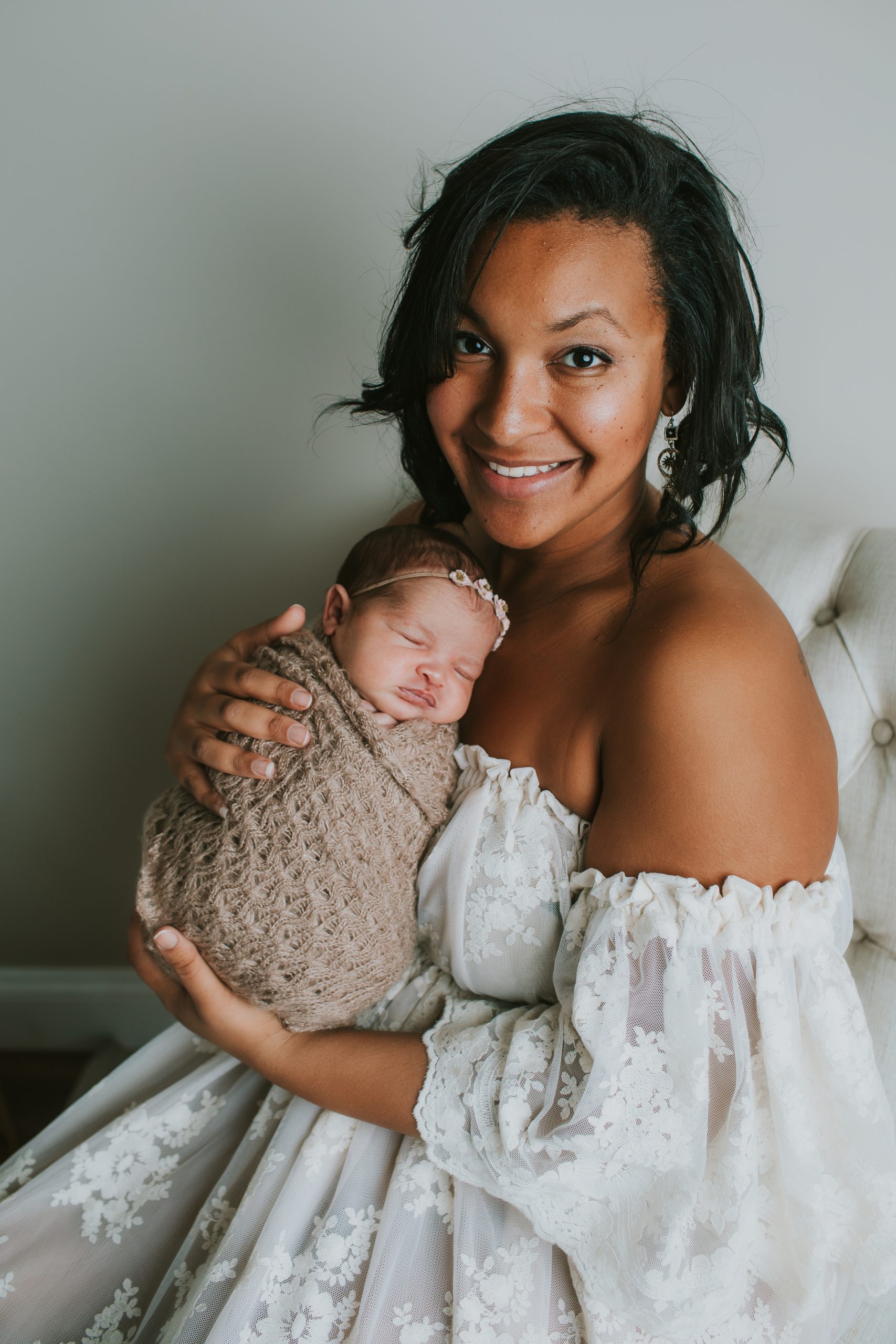 mother holding newborn