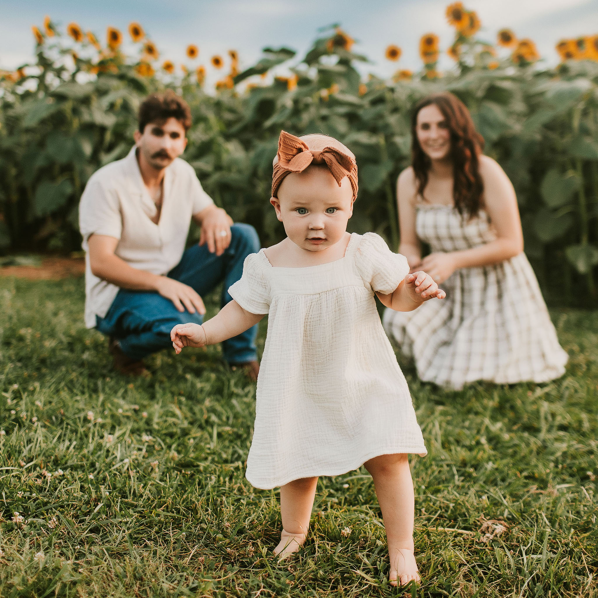 adorable young family of three