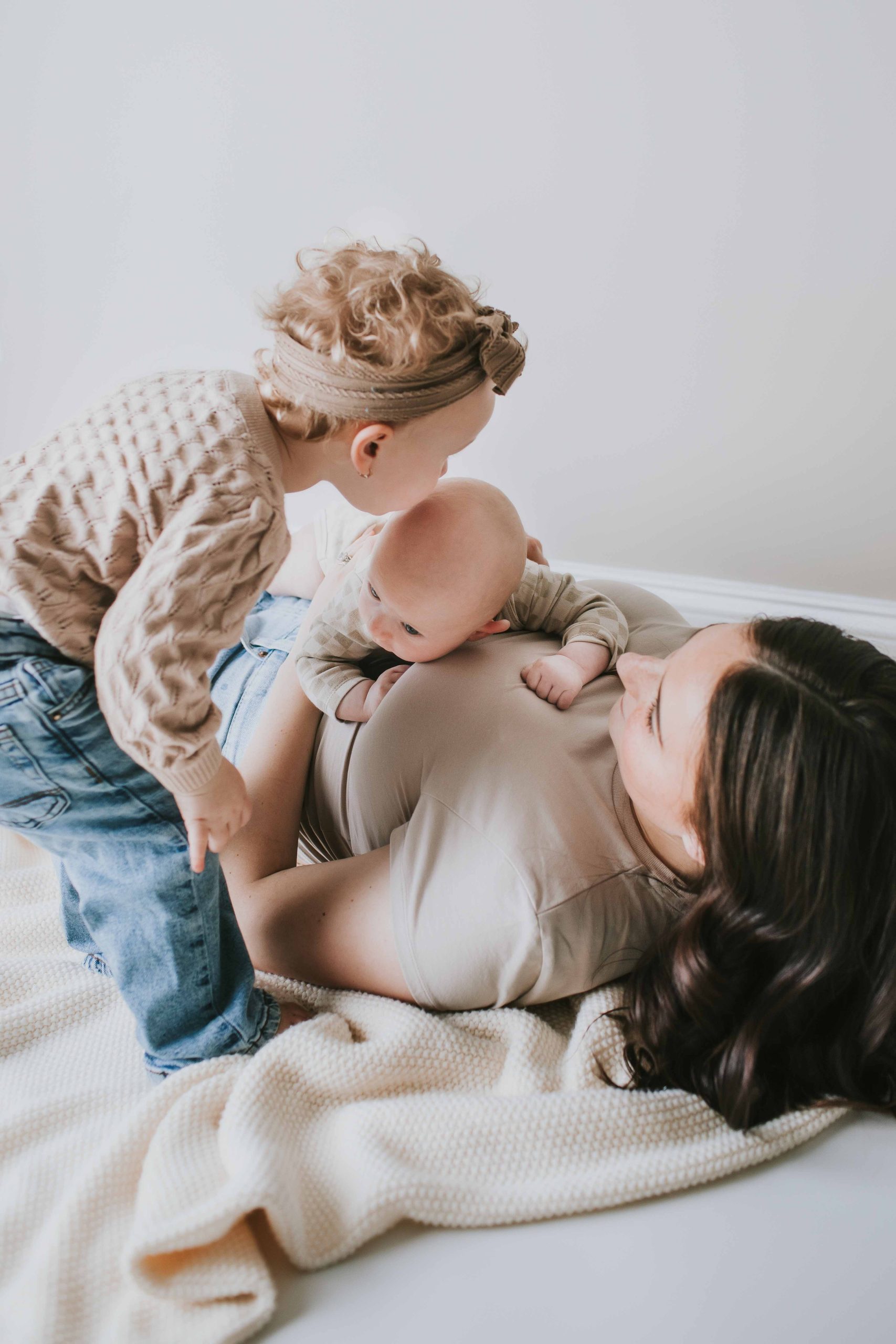 mom playing with babies