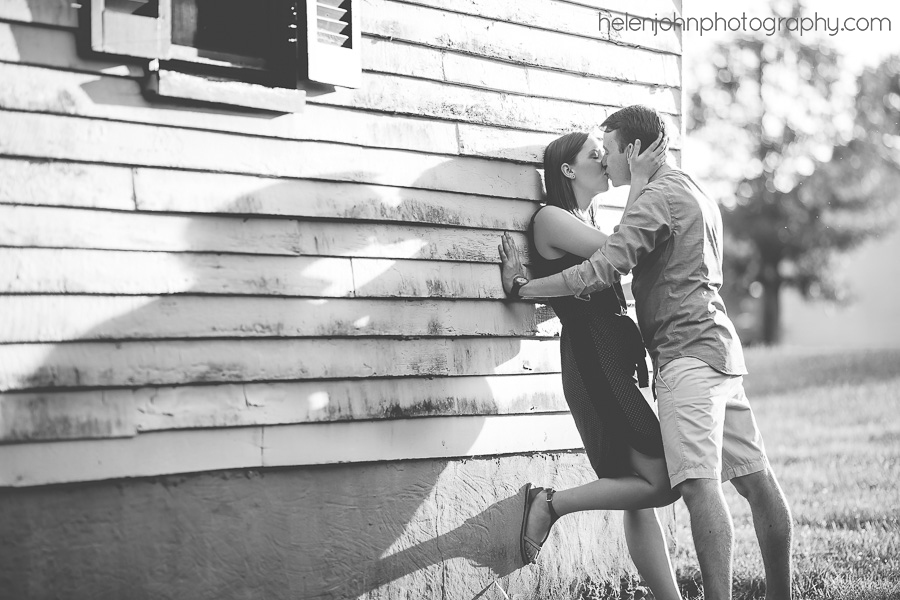 Couple kissing during engagement portrait session in Bethesda MD