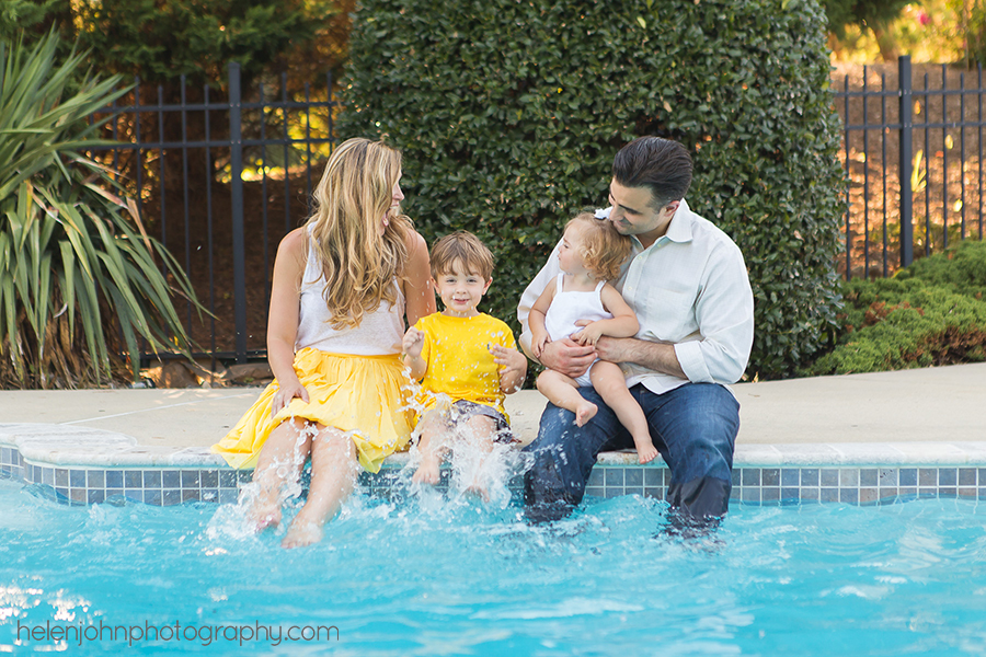 Family splashing in a pool