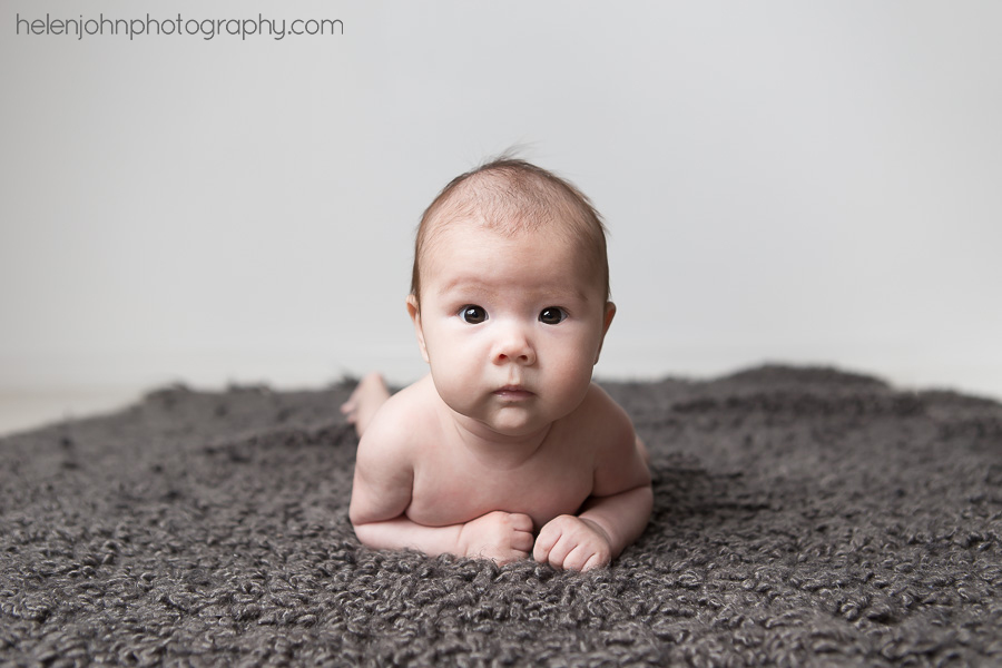 Baby lying on a soft blanket