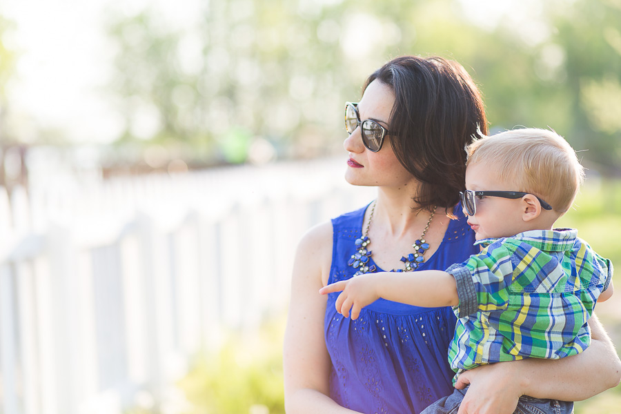 mother and son looking out in sunglasses