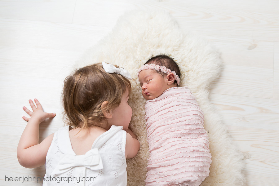 Newborn baby and her big sister