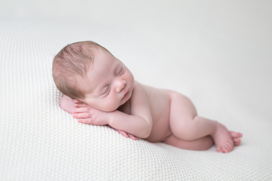 sweet and simple sleeping pose of newborn boy