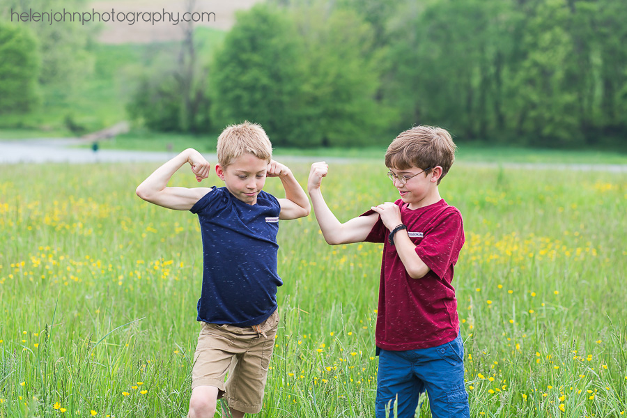 Little boys flexing their muscles