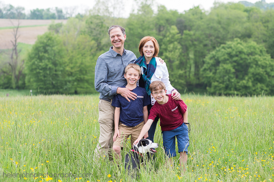 Family portrait standing in a field