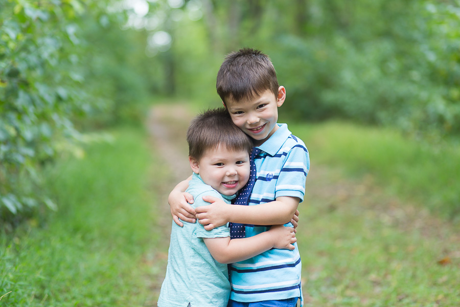 two little boys hugging