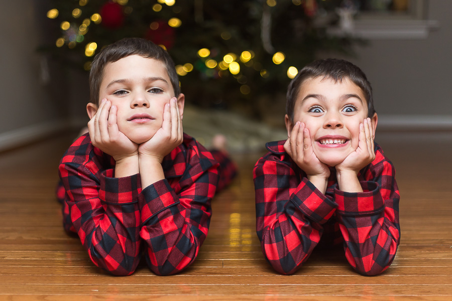 brothers in christmas pjs making crazy faces