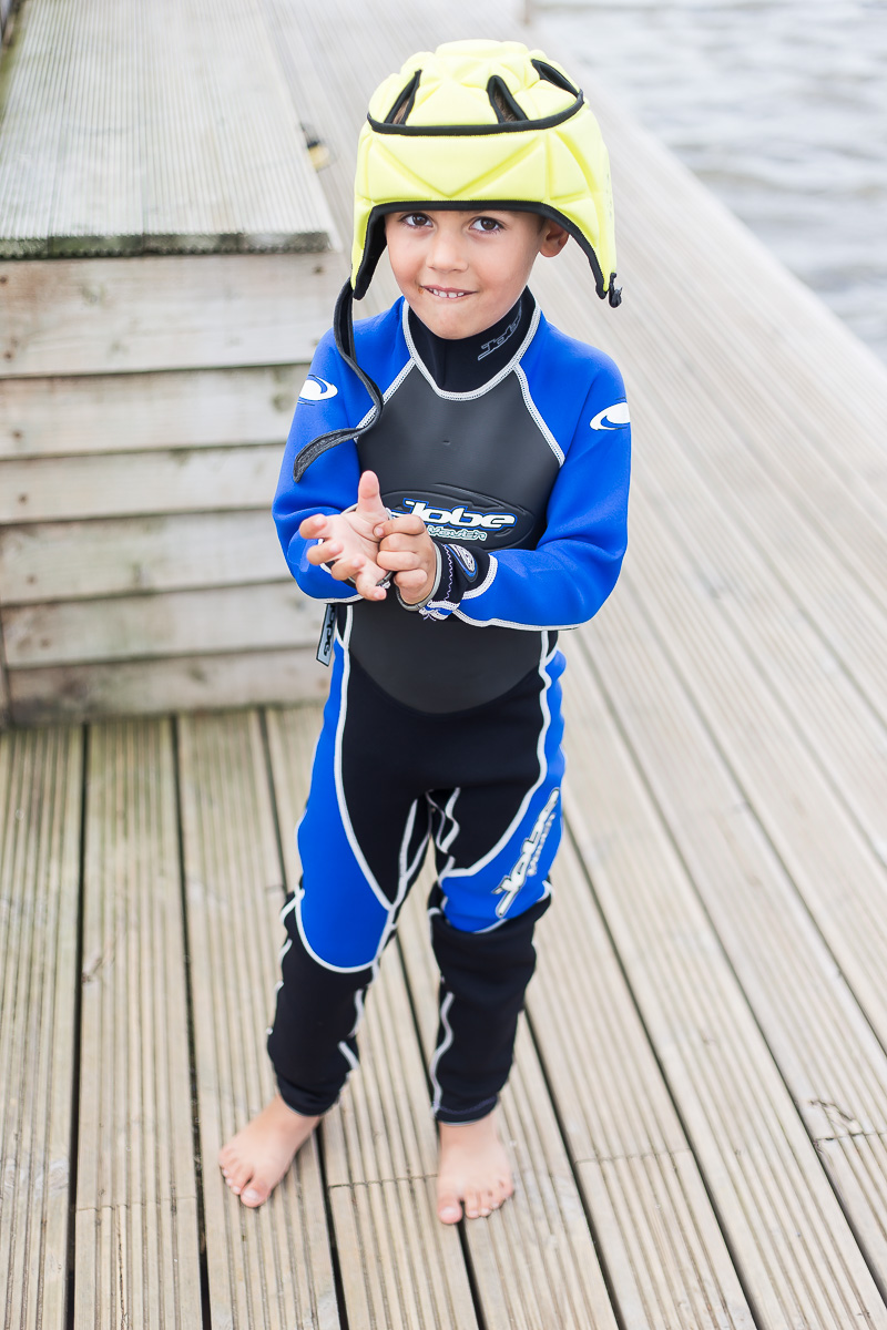 adorable little boy in wetsuit