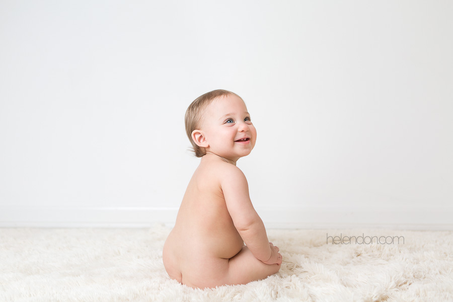 adorable 12 month old baby in the buff