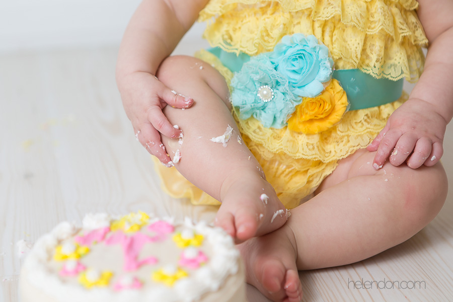 baby legs covered in frosting