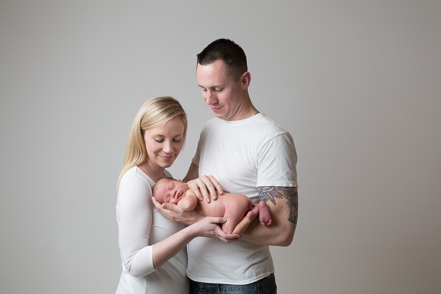 Parents Holding Newborn Baby Boy