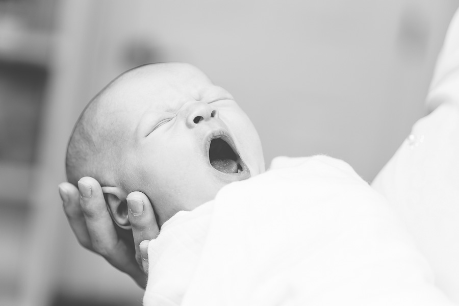 newborn baby yawn in black and white