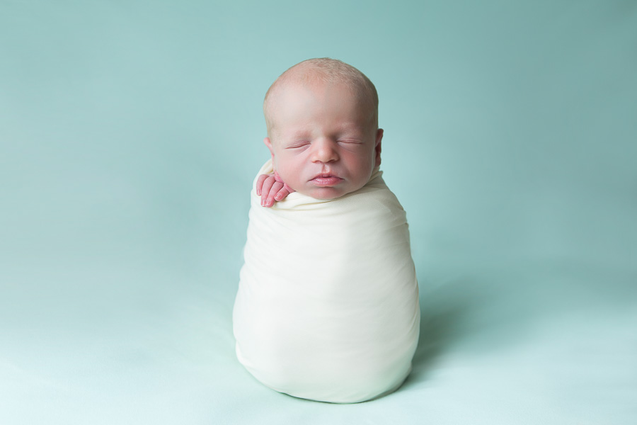 newborn boy potato sack pose