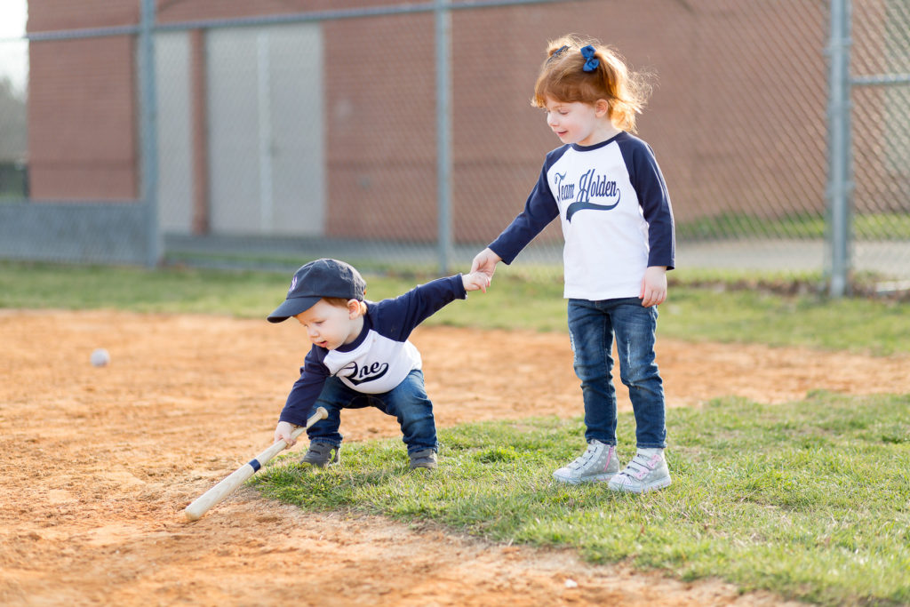 sibling photo in baseball jerseys