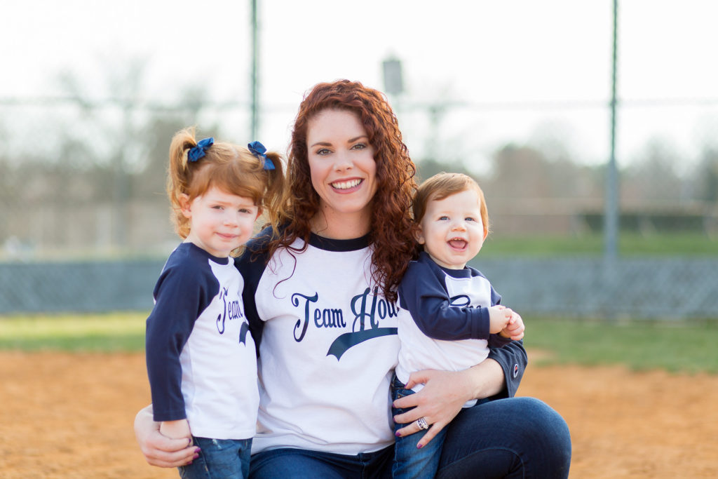 mother with two children in baseball shirts
