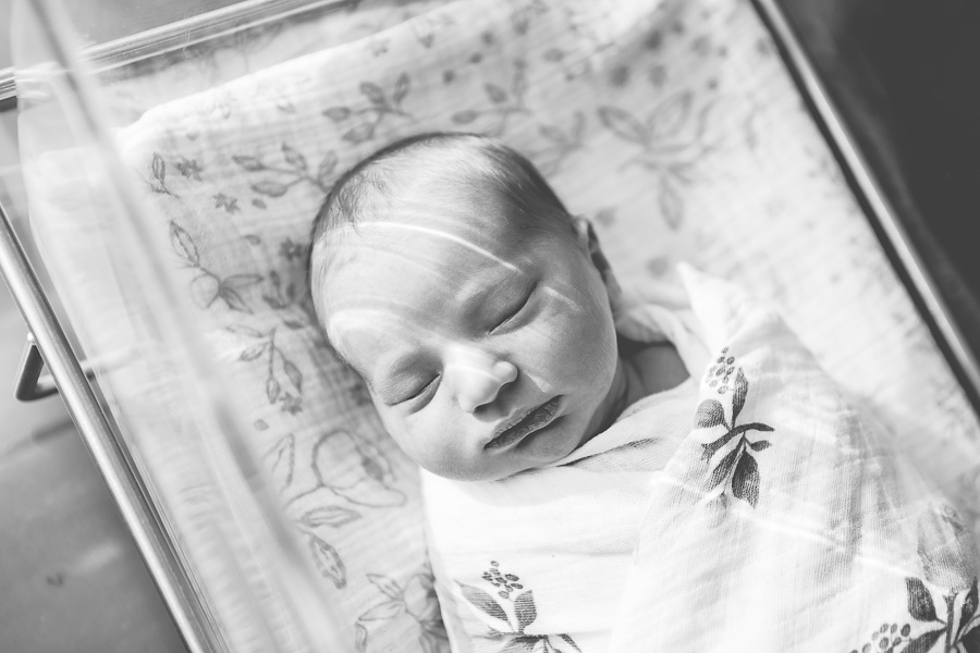 black and white photo of newborn at hosptial