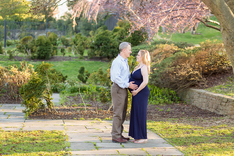 gorgeous spring garden and maternity couple portrait
