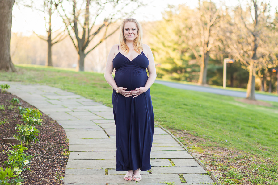 29 week pregnant with twins mother holding belly portrait
