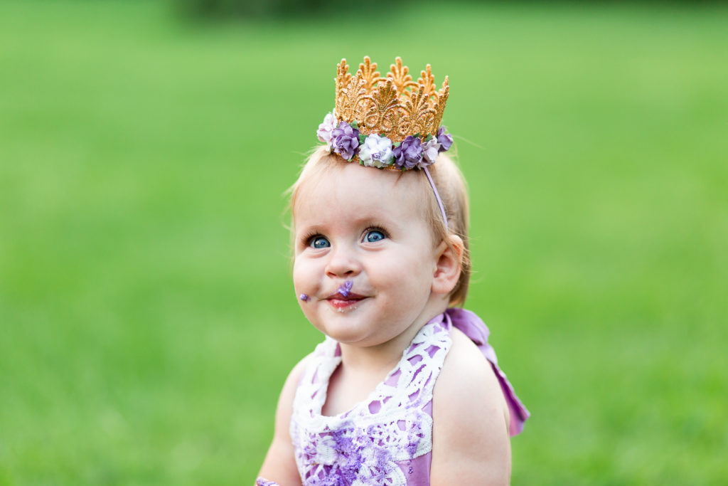adorable baby girl wearing crown